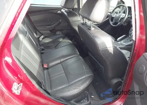 2013 Ford Focus Titanium z USA, uszkodzony, nr VIN 1FADP3J2XDL352611